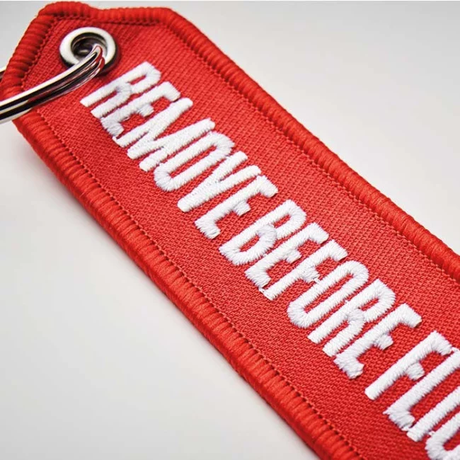 Porte-clés flamme brodé flèche 